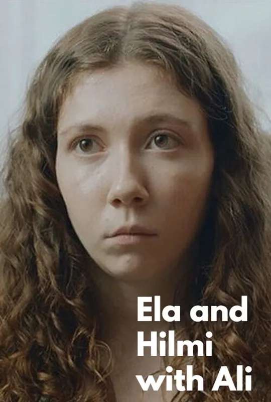Ela and Hilmi with Ali poster