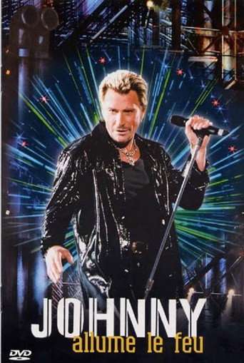 Johnny Hallyday Allume le feu au Stade de France poster